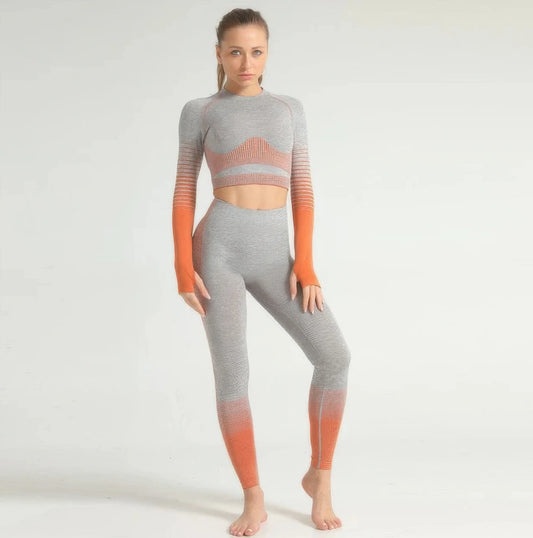 Woman wearing a gray and orange gradient athletic outfit on a white background