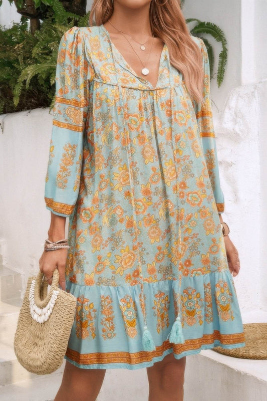 Ruched Bohe Print V-Neck Ruffle Hem Tassel Dress - Rosa Apparel