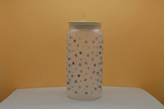 Wrap-around blue floral design on frosted 16oz beer can glass featuring small blue flowers