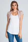 Crochet lace cropped shrug with open front and cap sleeves.