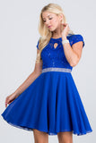 Lace and wool dobby, cap sleeve, fit and flare dress with waist embellishment.