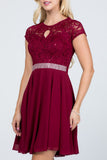 Lace and wool dobby, cap sleeve, fit and flare dress with waist embellishment.