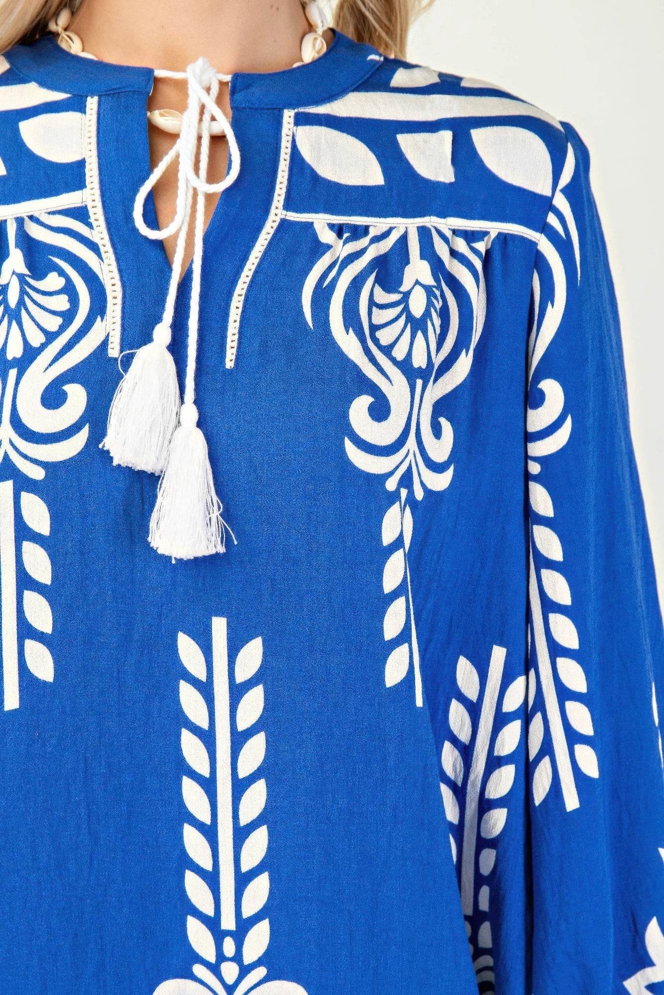 Printed 3/4 Sleeve Dress With Tassel Tie And Fringe Detail On Hem - Rosa Apparel