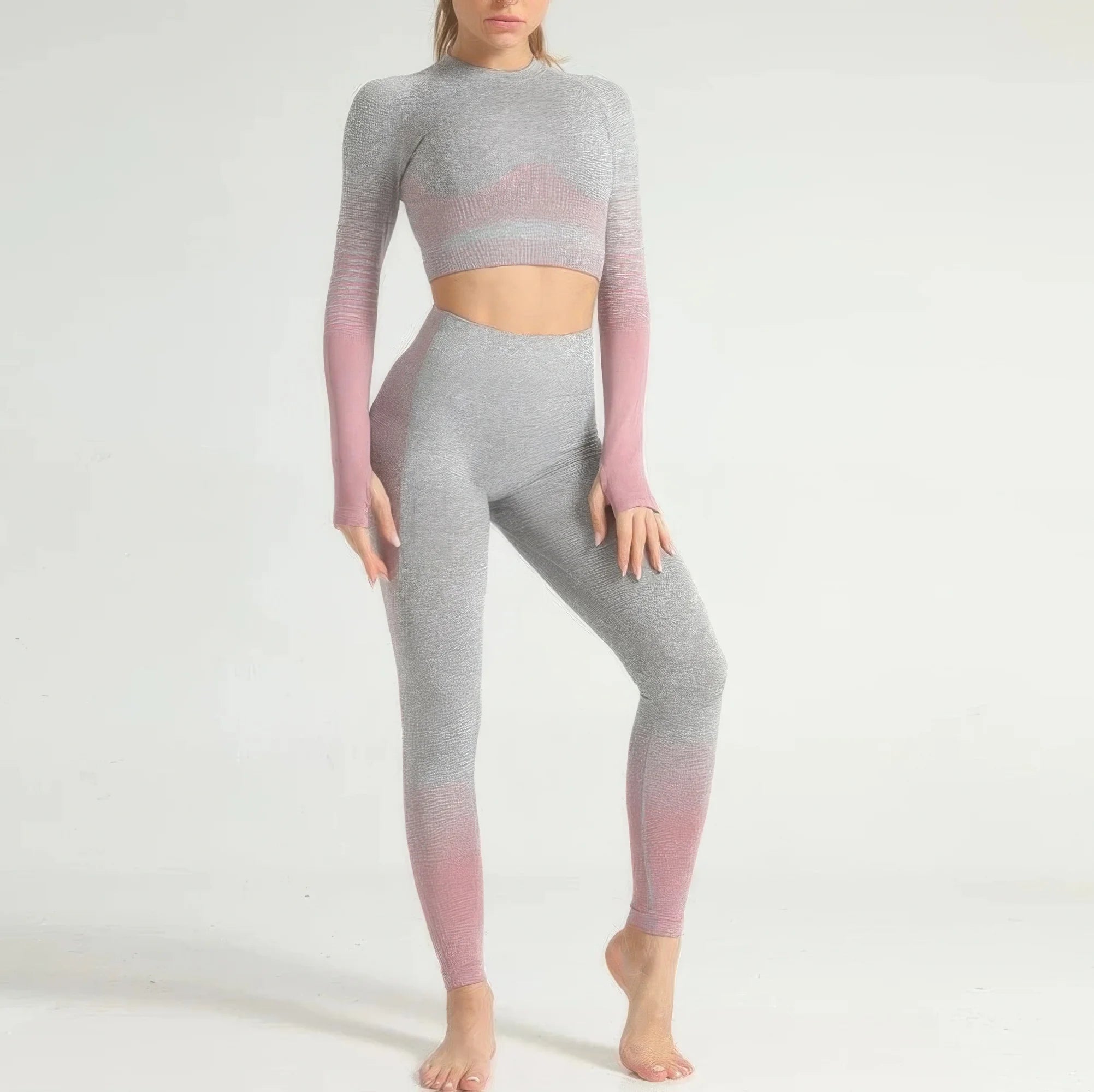 Person wearing a gray and pink gradient athletic outfit on a white background