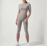 Person wearing a gray and pink gradient outfit on a white background